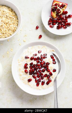 Hot autumn breakfast or lunch porridge or pudding with apple and spices ...