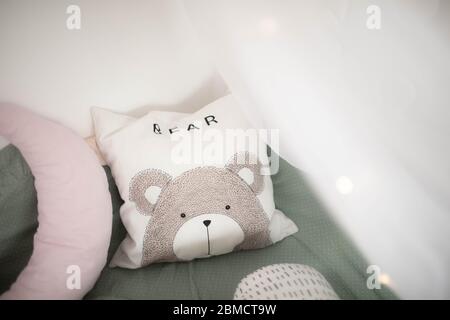 Small square pillows on the sofa. Close up. Stock Photo