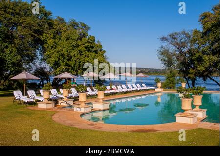 The swimming pool of the Royal Livingston Hotel near Livingstone, Zambia. Stock Photo