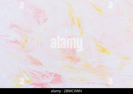 Light pink and yellow rough concrete wall or stucco texture background Stock Photo
