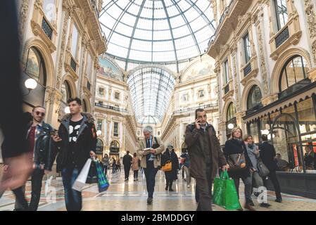 Milan, Italy - 15 March 2017: Visitors passing by iat Gelleria Vittorio Emanuelle II Stock Photo