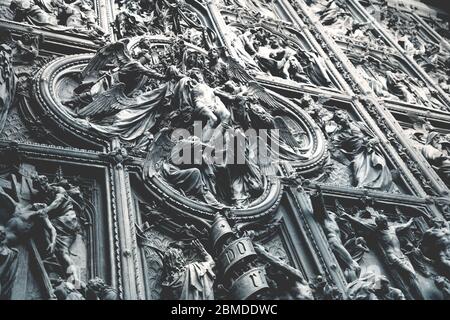 Detail of Jesus scenes on the carved doors of the Cathedral of Milan, Italy Stock Photo