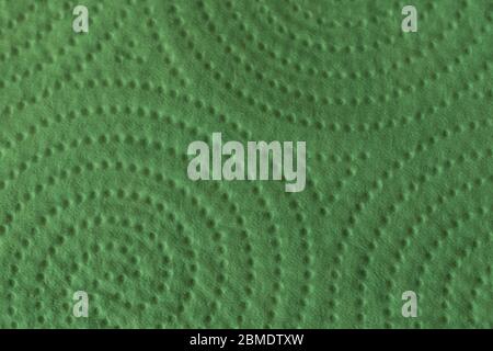 Texture of a roll of paper towel in green color. Close up texture. Background. Stock Photo