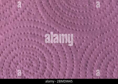 Texture of a roll of paper towel in pink color. Close up texture. Background. Stock Photo