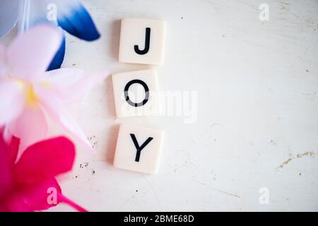Joy in block letters Stock Photo - Alamy