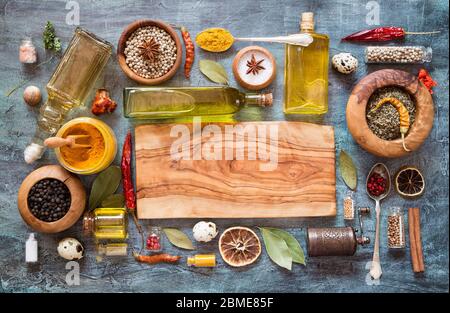 Herbs and spices on dark grunge background Stock Photo