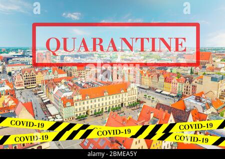 Quarantine in Poland. Top aerial panoramic view of Wroclaw old town. No travel and lockdown concept. Coronavirus outbreak Covid-19 pandemic concept. Canceled tourist vacation. Barrier tape. Stock Photo