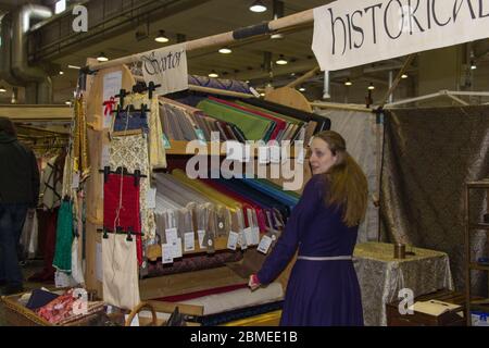 Italy, Piacenza - March 24 2018: the view of textile stall at annual medieval market in Piacenza on March 24 2018, Emilia-Romagna, Italy. Stock Photo