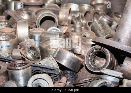 Useless, worn out rusty auto parts and other parts. Stock Photo