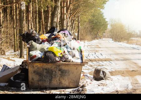 Garbage waste in park full of all sort of trash. Stock Photo