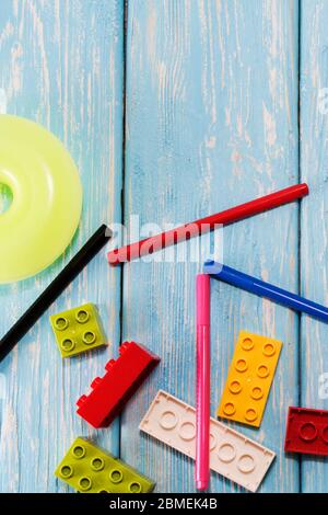 Multicolored plastic building blocks of the designer. Background of bright plastic building blocks Stock Photo
