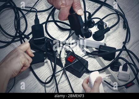 Lots of electrical outlets-enabled devices. Power saving. Stock Photo