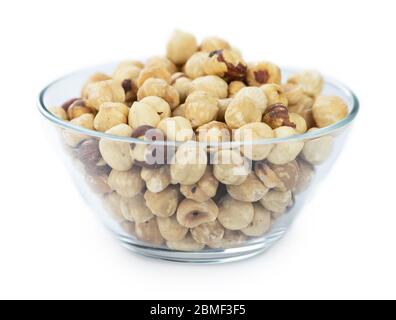 Peeled Hazelnuts isolated on white background (close up shot) Stock Photo
