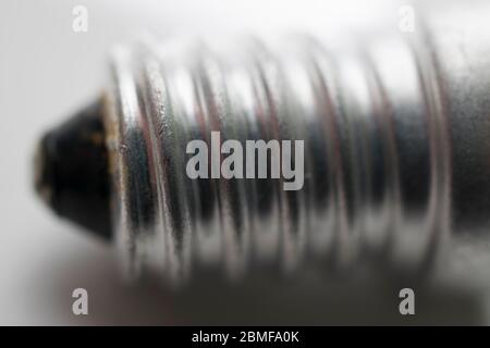 Screw in fitting of a light bulb Stock Photo