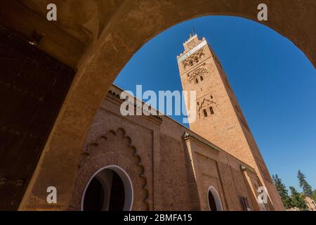 View of Koutoubia Mosque through archway during daytime, Marrakesh, Morocco, North Africa, Africa Stock Photo