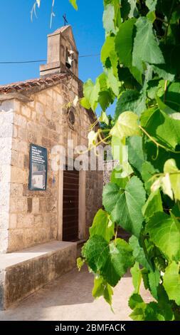 Old stone church 'Gospe od Karmena' (Ladies of Carmen), Rose Village, Lustica peninsula, Kotor Bay, Montenegro, Europe Stock Photo