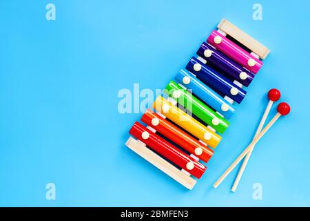 Colorful xylophone on yellow background. Stock Photo