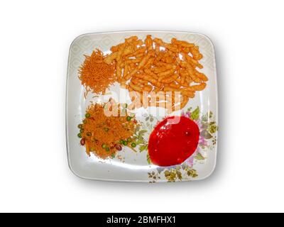 Snacks served in white plate spicy catch-up Stock Photo