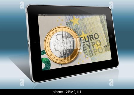 a 1 euro coin from the Netherlands on a 5 euro banknote, view on a Tablet PC Stock Photo