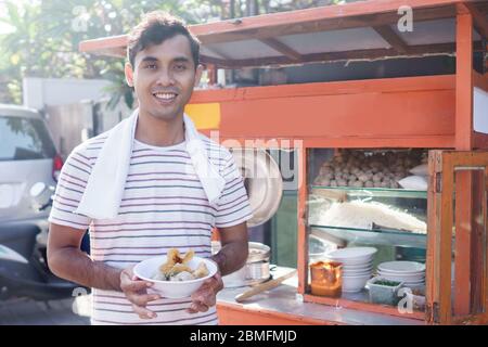 Meatball Street Food Vendor Asian Man Selling Bakso By Walking And Pushing Down The Food Carts Stock Photo Alamy