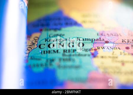 Shallow depth of field focus on geographical map location of country Republic of Congo in Africa continent on atlas Stock Photo