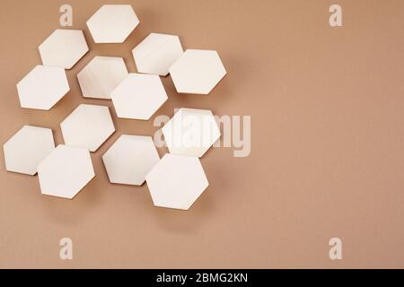 Honeycomb of different high on brown background Stock Photo