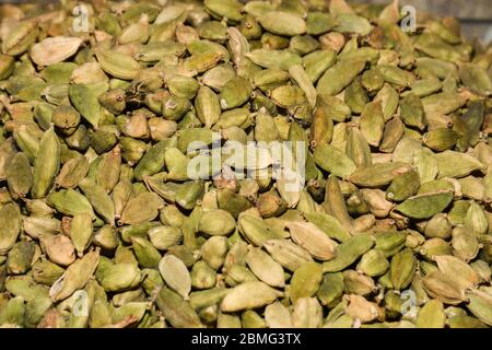 Peeled pistachios full frame background for sale in market Stock Photo