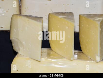 Turkish cheese: full-fat beyaz peynir (white sheep's milk cheese,Greek feta),yellow kaşar peynir (“kosher” cheese, Greek kasseri),young, sweet or aged Stock Photo