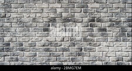 Grey brick wall. Hand made brick wall. Stock Photo