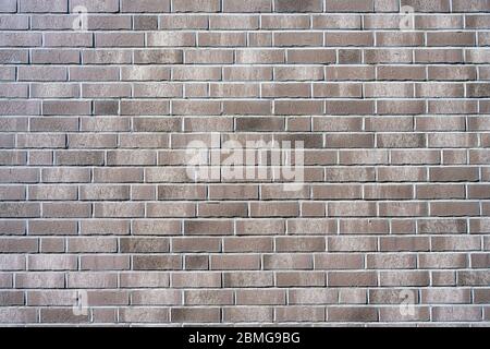 Background from a new gray brick wall Stock Photo
