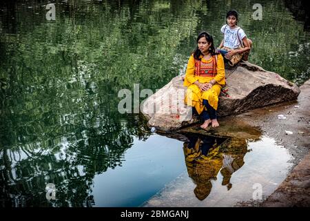 Ablutions and prayers along the Ram Ghat on Mandakini river of Chitrakut, Uttar Pradesh, India Stock Photo