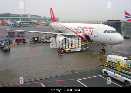 AMSTERDAM, NETHERLANDS -2 JAN 2020- View of an airplane from Air Arabia, a low-cost airline from the United Arab Emirates, at the Schiphol Amsterdam A Stock Photo