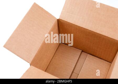 Open empty rectangular cardboard box isolated on white background. Mockup for design and advertising. Brown craft paper or carton box mock up Stock Photo