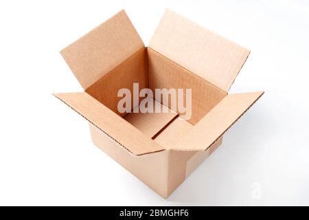 Open empty rectangular cardboard box isolated on white background. Mockup for design and advertising. Brown craft paper or carton box mock up Stock Photo