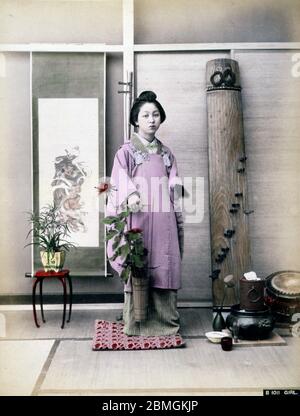 1880s Japan - Japanese Woman with Flowers ] — A woman in kimono