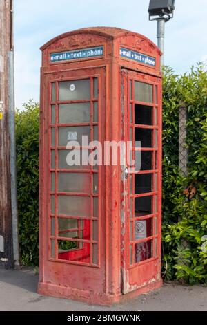 Bristol-May 2020-England- a close up view of a old red phone booth Stock Photo