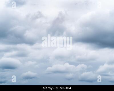 natural background - many rainy clouds in gray sky on spring cloudy day Stock Photo