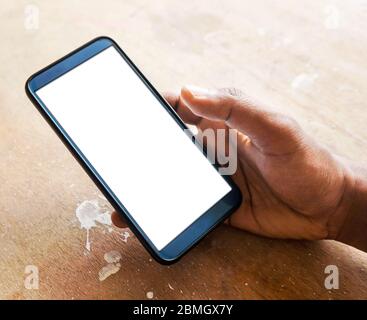 hand holding smart phone with white screen Stock Photo