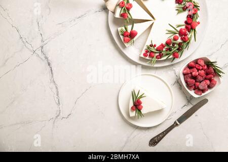 Homemade cheesecake with raspberries on a plate. View from above. Place for text. Stock Photo