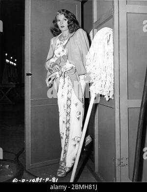 RITA HAYWORTH outside her Dressing Room on set candid during filming of GILDA 1946 director CHARLES VIDOR gowns JEAN LOUIS producer VIRGINIA VAN UPP Columbia Pictures Corporation Stock Photo