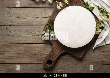 Tasty homemade cheesecake on a wooden background. Place for text. Stock Photo
