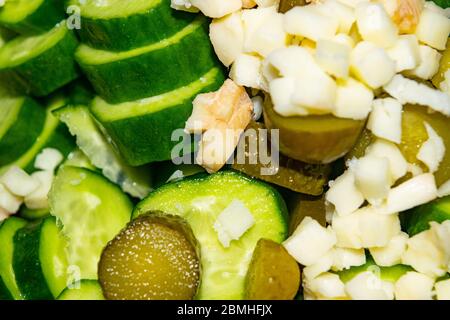 Vegetable salad sliced tomatoes, cucumbers, onions and pickles. Close up. Healthy food, fitness diet Stock Photo
