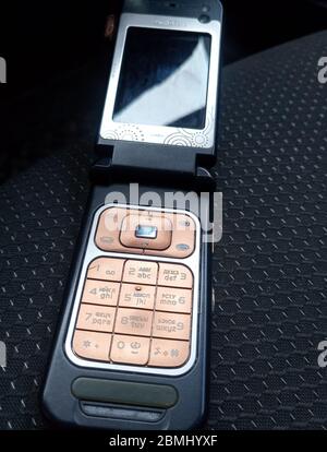 Krasnodar, Russia - June 25, 2019: Flip phone Nokia 7390. Retro telephone on outdated technology. Stock Photo
