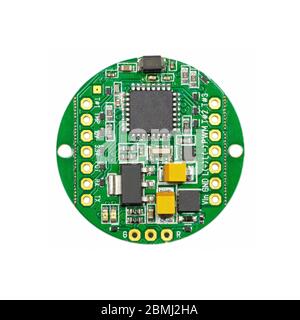 Green round led pulse width modulation dimmer PCB board surface mount components in a close-up top view Stock Photo