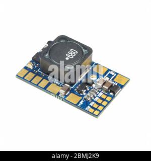 Green round led pulse width modulation dimmer PCB board surface mount components in a close-up side view Stock Photo