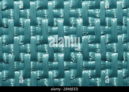 Plastic fiber weave texture. wickerwork material close up background Stock Photo