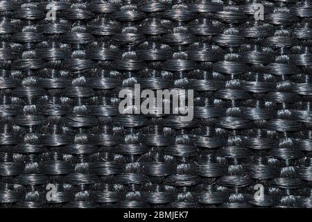 Plastic fiber weave texture. wickerwork material close up background Stock Photo