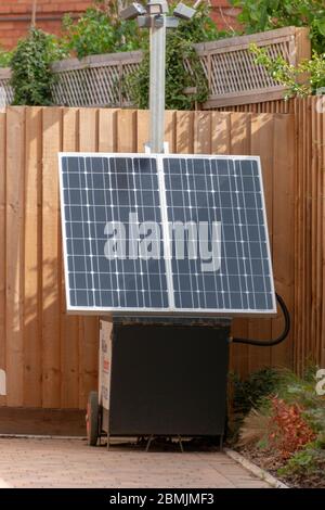 Bristol-May-2020-England-a close up view of a portable solar pannel charger outside a hotel on a main street Stock Photo