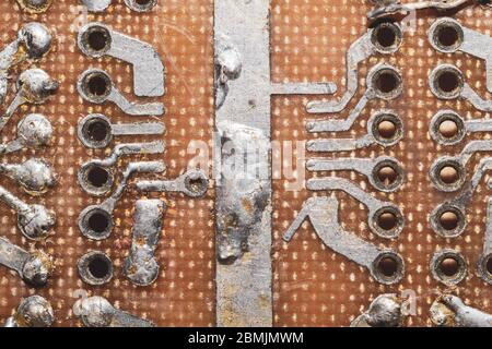 Handmade circuit board. industrial background. textolite with soldered tracks Stock Photo