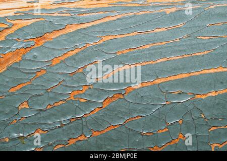 Rough wood texture with peeling paint. old wooden texture with cracked paint close up Stock Photo